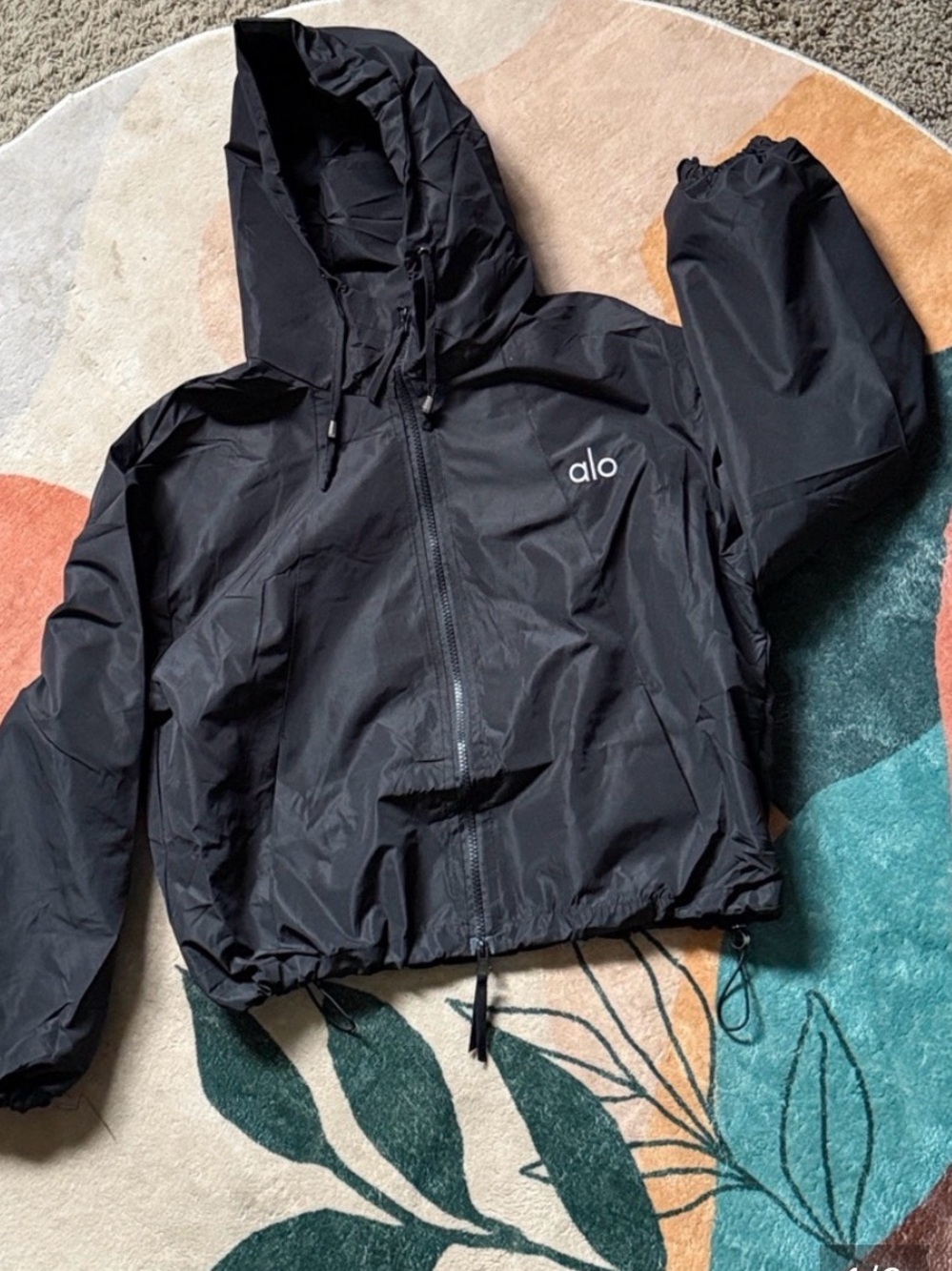 Black jacket with embroidered alo